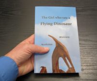 front cover of Whitcomb's "The Girl who saw a Flying Dinosaur"